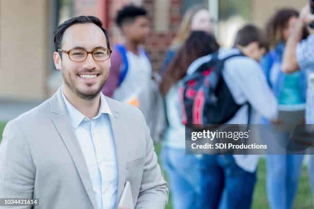 confident high school teacher - educational establishment stock pictures, royalty-free photos & images