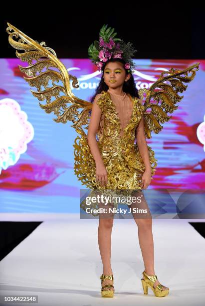 Models walk the runway for JAL Fashion on day 2 of the House of iKons show during London Fashion Week September 2018 at the Millennium Gloucester...