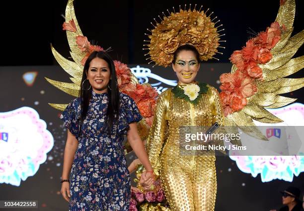 Model and designer walk the runway for JAL Fashion on day 2 of the House of iKons show during London Fashion Week September 2018 at the Millennium...