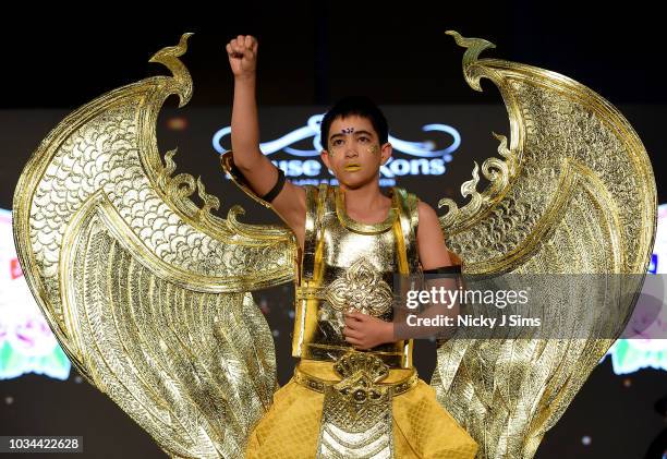 Models walk the runway for JAL Fashion on day 2 of the House of iKons show during London Fashion Week September 2018 at the Millennium Gloucester...