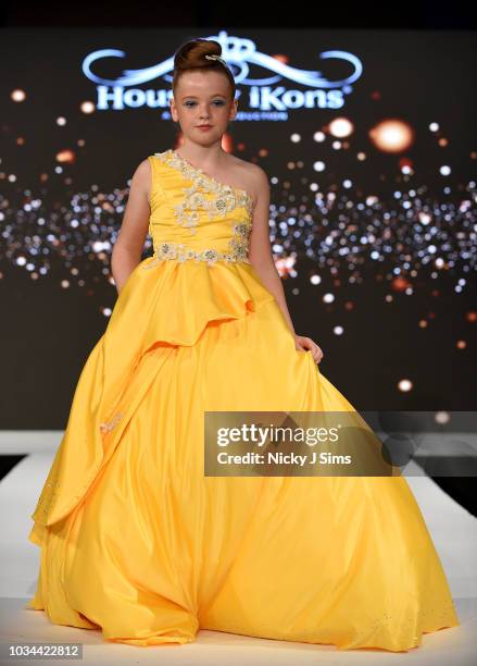 Models walk the runway for Korn Taylor on day 2 of the House of iKons show during London Fashion Week September 2018 at the Millennium Gloucester...