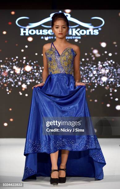 Models walk the runway for Korn Taylor on day 2 of the House of iKons show during London Fashion Week September 2018 at the Millennium Gloucester...