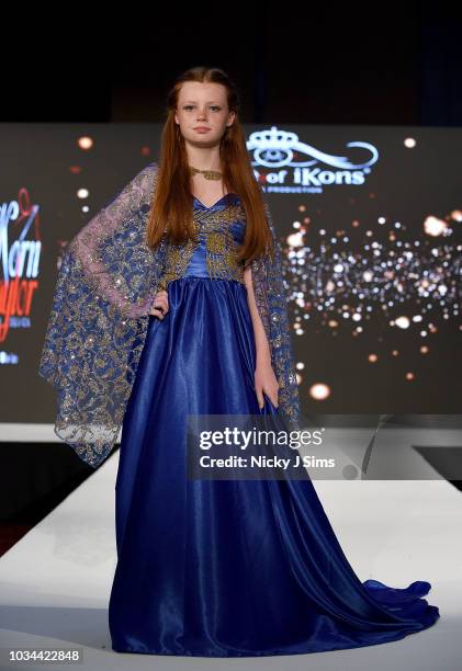 Models walk the runway for Korn Taylor on day 2 of the House of iKons show during London Fashion Week September 2018 at the Millennium Gloucester...