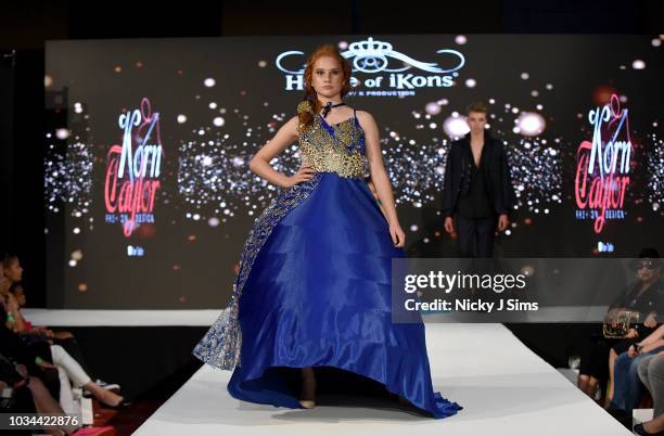 Models walk the runway for Korn Taylor on day 2 of the House of iKons show during London Fashion Week September 2018 at the Millennium Gloucester...