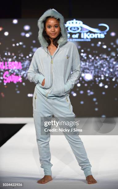 Models walk the runway for Courtney Allegra on day 2 of the House of iKons show during London Fashion Week September 2018 at the Millennium...