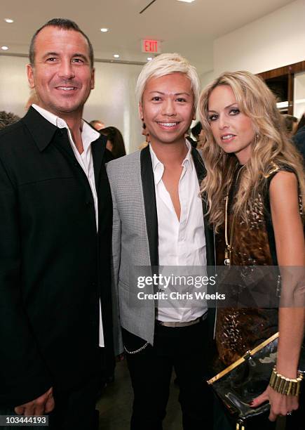 Mike Egeck of 7 For All Mankind, from left, Alex Sum and stylist Rachel Zoe attend the opening of the 7 For All Mankind store on Robertson Boulevard...