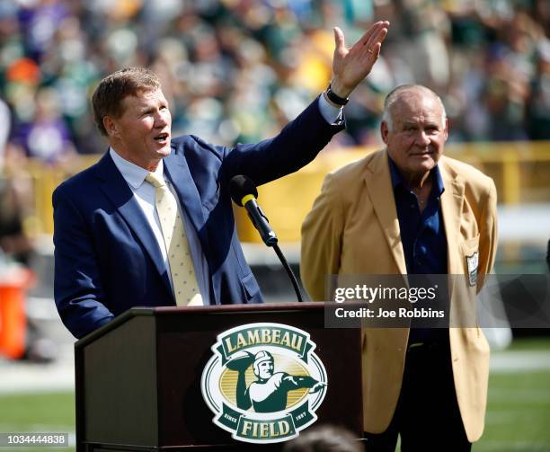 President Mark Murphy of the Green Bay Packers speaks at a halftime ceremony honoring Jerry Kramer during a game between the Green Bay Packers and...