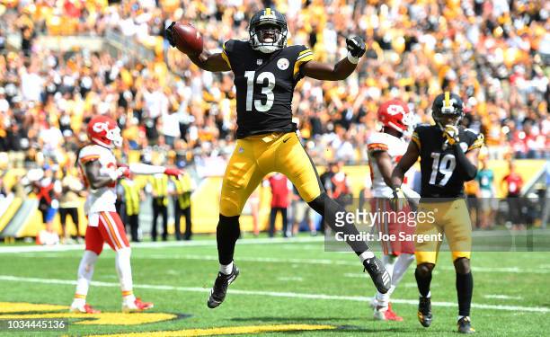 James Washington of the Pittsburgh Steelers celebrates after a 14 yard touchdown reception in the first half during the game against the Kansas City...