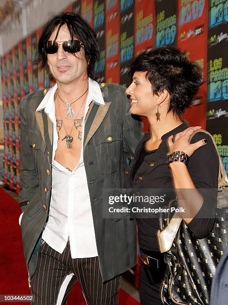 Musician Tommy Lee and guest arrive at the "Los Premios MTV 2009" Latin America Awards held at Gibson Amphitheatre on October 15, 2009 in Universal...