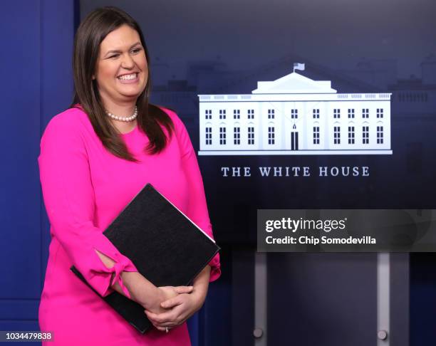 White House Press Secretary Sarah Huckabee Sanders prepares to take the podium during a news conference in the Brady Press Briefing Room at the White...