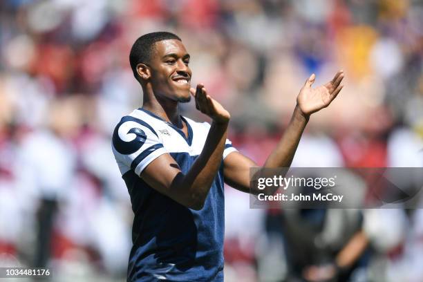 Los Angeles Rams cheerleader Quinton Peron, one of the first male NFL cheerleaders, cheers ahead of the game against the Arizona Cardinals at Los...