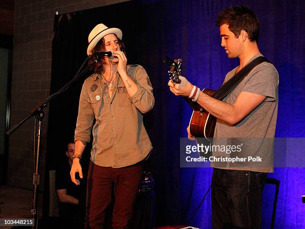 Musicians Cisco Adler and Kelley James perform onstage during "Learn to Ride" with the Audi Sportscar Experience 2010, presented by Oakley at...