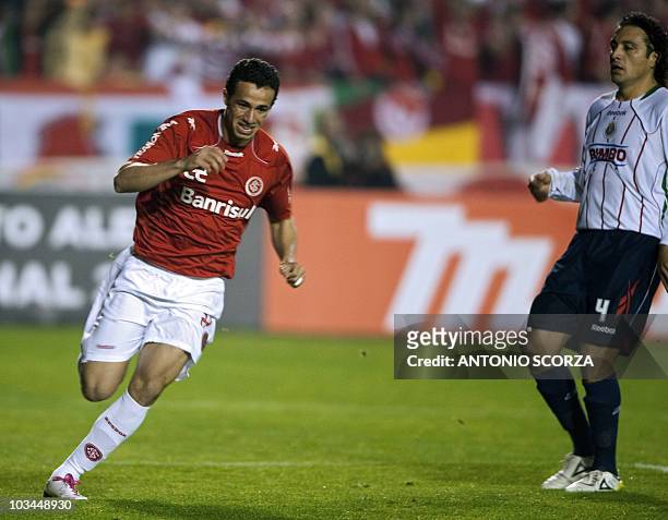Brazil's Internacional player Leandro Damiao celebrates his goal against Mexico's Chivas on August 18, 2010 during their Libertadores final football...