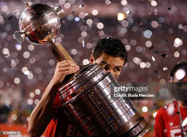 Bolivar of Internacional celebrates championship title after defeating Chivas during a final match as part of the 2010 Copa Santander Libertadores at...