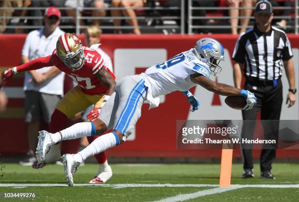 Kenny Golladay of the Detroit Lions dives for a touchdown against the San Francisco 49ers during the first quarter of their NFL football game at...