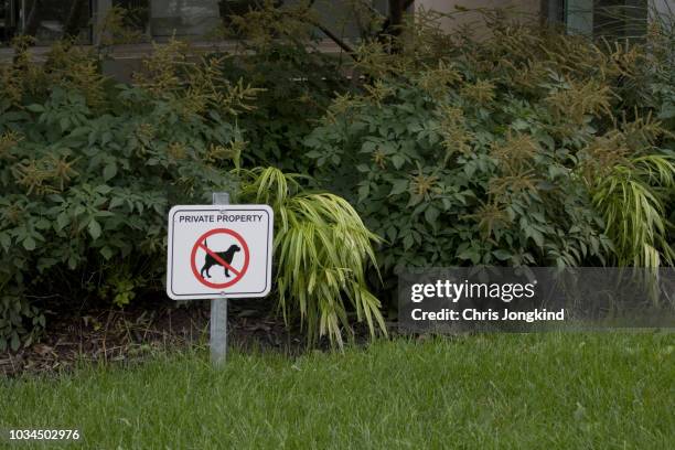 private property no dogs sign - keep off the grass sign stock pictures, royalty-free photos & images