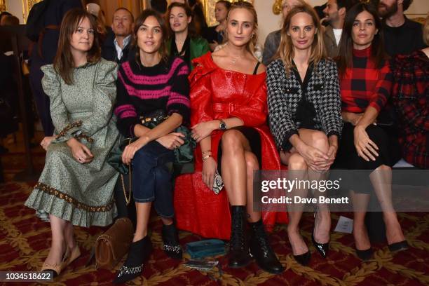 Alexa Chung, Elisabeth von Thurn und Taxis, Lauren Santo Domingo and Julia Restoin Roitfeld attend the Simone Rocha front row during London Fashion...