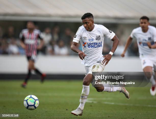 Rodrygo of Santos controls the ball during the match between Santos and Sao Paulo as a part of Campeonato Brasileiro 2018 at Vila Belmiro Stadium on...