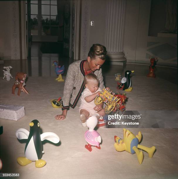 Princess Paola of Belgium with her son Prince Philippe .