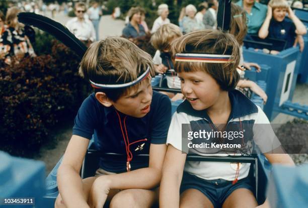 Crown Prince Frederik of Denmark and his brother Prince Joachim at a fun park in 1977.
