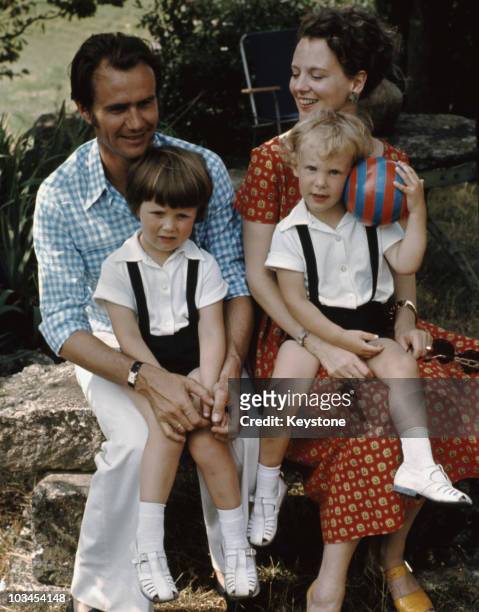 Queen Margrethe of Denmark with her husband Prince Henrik and their sons Frederik and Joachim at Chateau de Cayx in Cahors, Southern France in August...