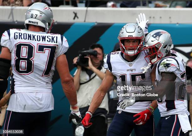New England Patriots wide receiver Chris Hogan celebrates his touchdown reception during the third quarter. The Jacksonville Jaguars host the New...