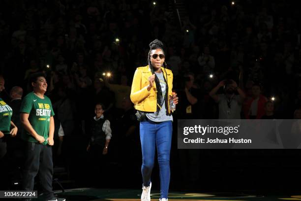 Crystal Langhorne of the Seattle Storm is introduce to fans at KeyArena during the the parade celebration for their WNBA championship in Seattle,...