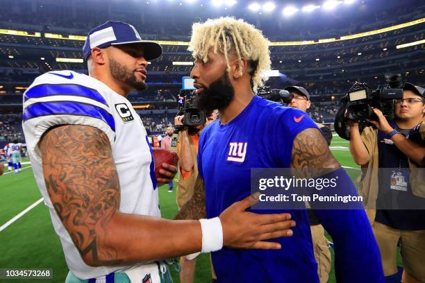 Dak Prescott of the Dallas Cowboys greets Odell Beckham Jr. #13 of the New York Giants after the Dallas Cowboys beat the New York Giants 20-13 at...