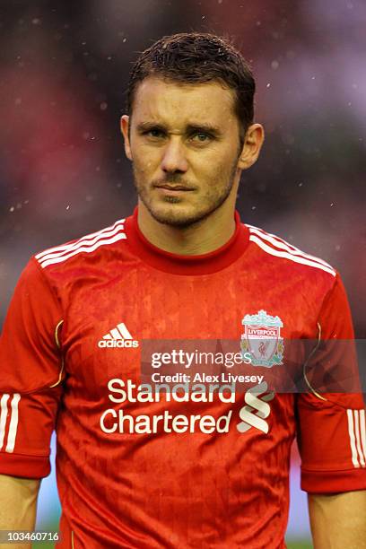 Fabio Aurelio of Liverpool looks on prior to the UEFA Europa League play-off first leg match beteween Liverpool and Trabzonspor at Anfield on August...