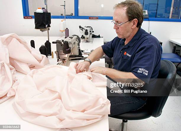 Takata employee sews an airbag at Takata's current crash-testing facility August 19, 2010 in Auburn Hills, Michigan. Takata dedicated a new,...