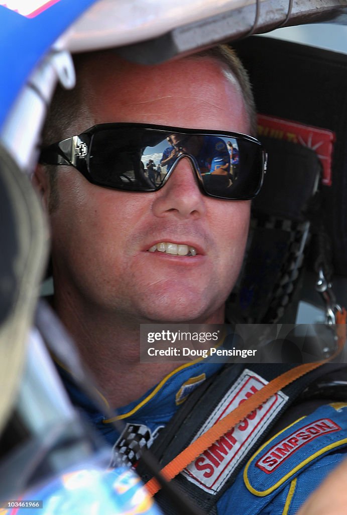 Eric Holmes Racing Eric Holmes driver osf the NAPA Toyota looks from his car during ...