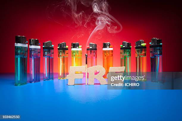 "fire" sign and lighters and match. - feuerzeug stock-fotos und bilder