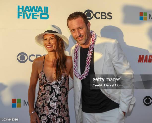 Alex OLoughlin and his wife, surfer Malia Jones attend the Sunset On The Beach event celebrating the 50th anniversary of "Hawaii Five-0" and the...