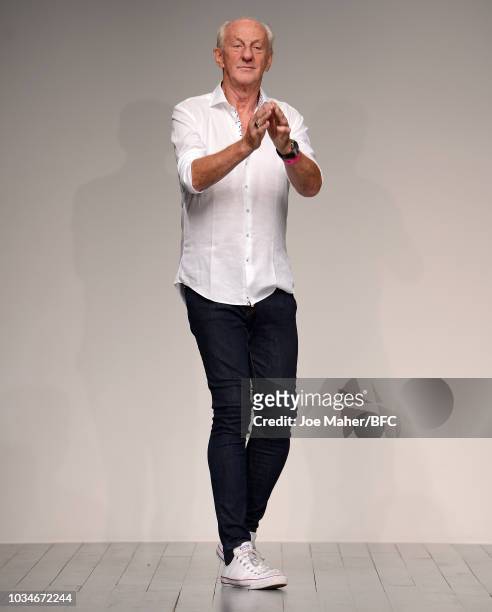 Fashion designer Paul Costelloe walks the runway at the finale of his presentation during London Fashion Week September 2018 on September 17, 2018 in...
