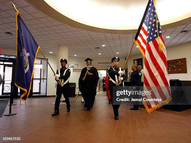 An Honor Guard leads New inductee's into the auditorium prior to the induction ceremony at the 3rd Pi Eta Kappa Honor Society Induction Ceremony at...