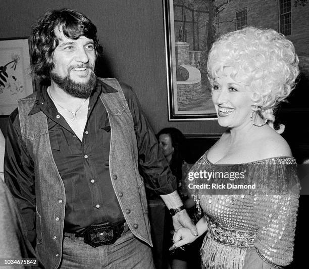 Nashville, Tn. Singer/Songwriter Waylon Jennings and Singer/Songwriter/Actor Dolly Parton attend The Best Little Whorehouse In Texas premiere at...