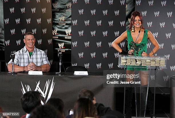 Wrestler John Cena and WWE diva Maria Kanellis attend a press conference announcing that WWE Chairman Vince McMahon will be giving away one million...