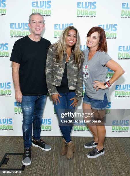 Elvis Duran and Danielle Monaro pose with Cohost Medha Gandhi as she joins "The Elvis Duran Z100 Morning Show" at Z100 Studio on September 17, 2018...