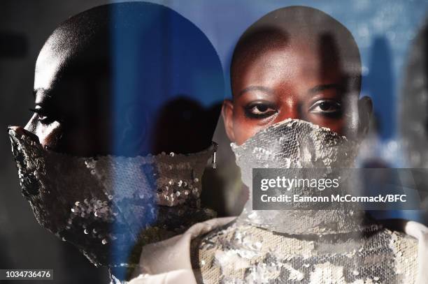 Model poses at the Wesley Harriott DiscoveryLAB during London Fashion Week September 2018 at The BFC Designer Showrooms on September 17, 2018 in...