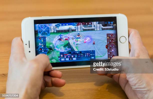 Teenager plays Wangzhe Rongyao, variably known in English unofficial translations as King of Glory, a multiplayer online battle arena developed and...