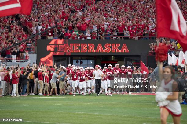 Nebraska coach Scott Frost taking field with his players before game vs Akron at Memorial Stadium. Lincoln, NE 9/1/2018 CREDIT: David E. Klutho