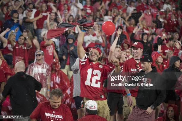 Nebraska fans in stands in the rain during game vs Akron at Memorial Stadium. Weather. Lincoln, NE 9/1/2018 CREDIT: David E. Klutho