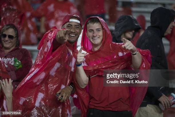 Nebraska fans in stands in the rain during game vs Akron at Memorial Stadium. Weather. Lincoln, NE 9/1/2018 CREDIT: David E. Klutho