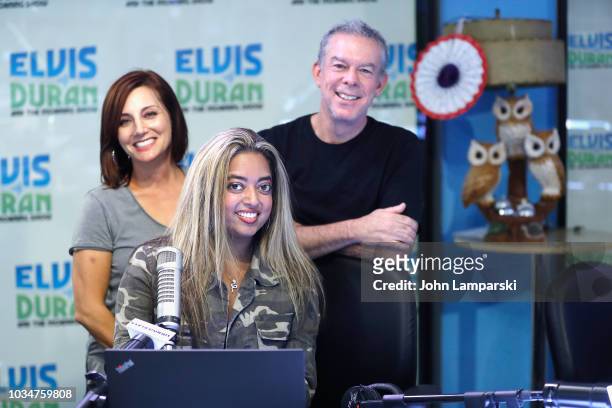Host Elvis Duran, Danielle Monaro and cohost Medha Gandhi pose as she joins "The Elvis Duran Z100 Morning Show" at Z100 Studio on September 17, 2018...