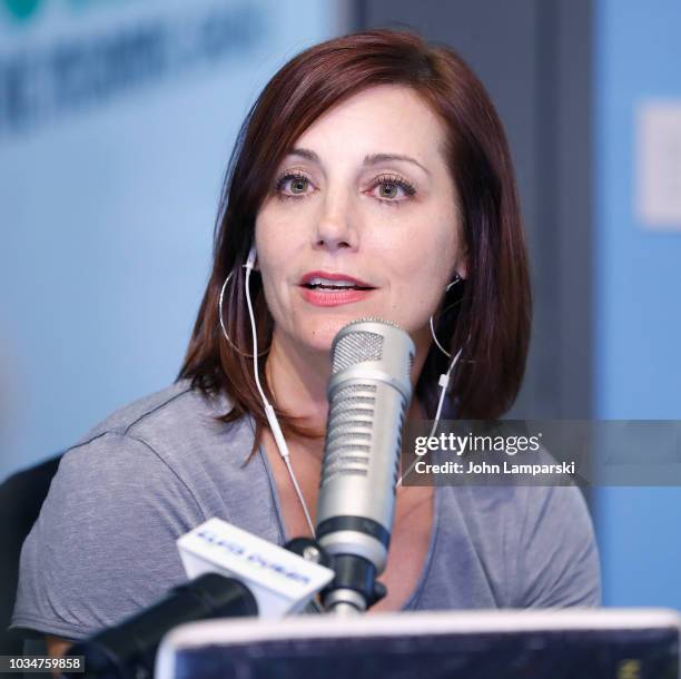 Danielle Monaro speaks as cohost Medha Gandhi joins "The Elvis Duran Z100 Morning Show" at Z100 Studio on September 17, 2018 in New York City.