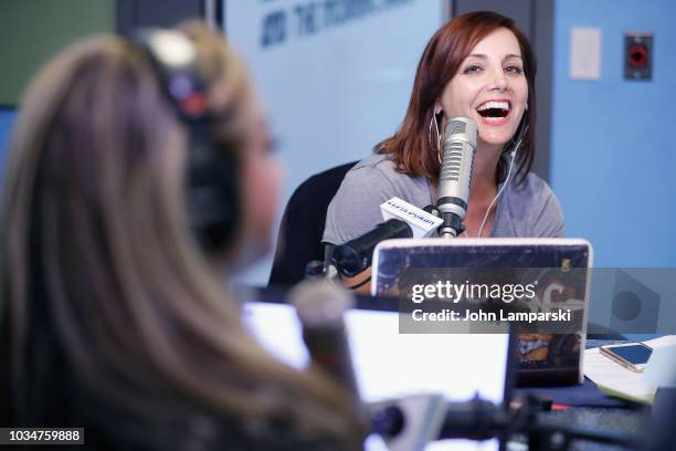 Danielle Monaro speaks as cohost Medha Gandhi joins "The Elvis Duran Z100 Morning Show" at Z100 Studio on September 17, 2018 in New York City.