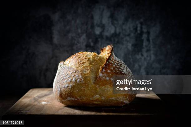 sourdough with dark background - dark bread stock pictures, royalty-free photos & images