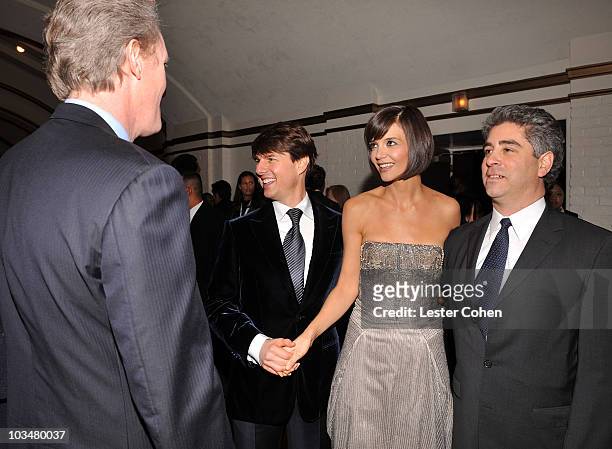 Overture's Chris McGurk, actor Tom Cruise, actress Katie Holmes and Overture's Danny Rosett arrive at the "Mad Money" premiere at Mann Village...