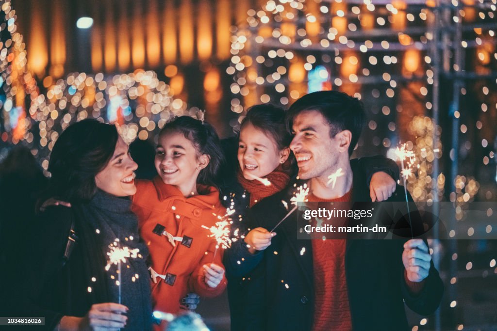 Happy family celebrating Christmas and New Year together