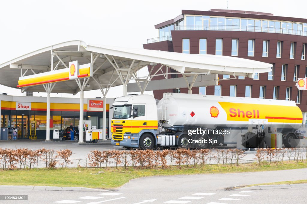 Shell Fuel Delivery Shell Fuel Delivery Trucks Supplying A Gas Station With Fuel High-Res ...